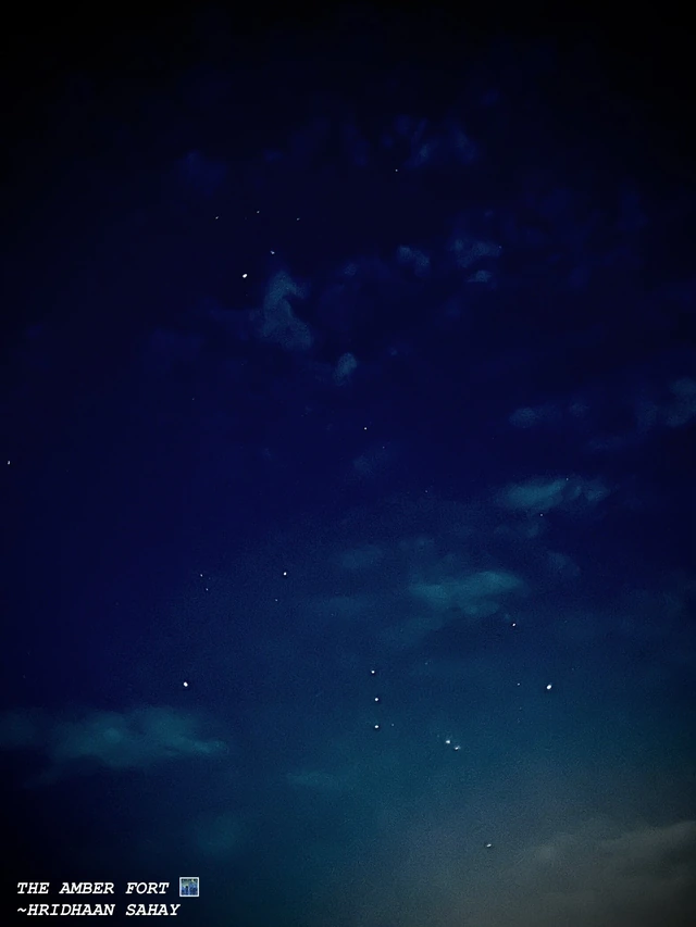 Stars between drifting clouds at Amer Fort.