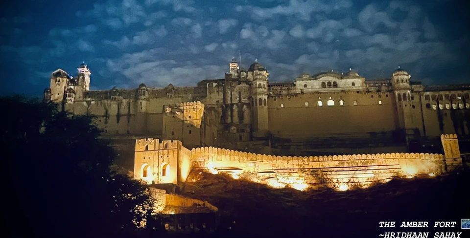 Amer Fort lit up at night.
